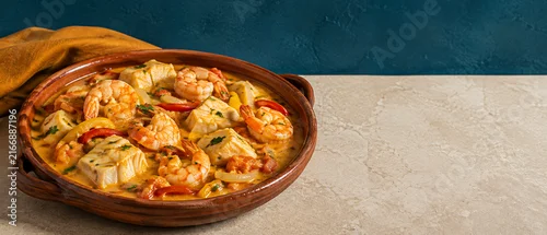 Obraz  z motywem Brazilian Moqueca Baiana Coconut Seafood Stew with Fish and Shrimp