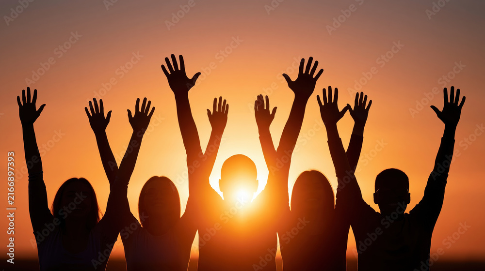 Fototapeta premium Silhouette crowd sunset celebration achievement moment group raised hand orange sunlight