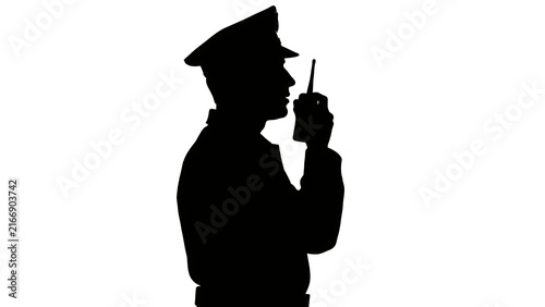 Silhouette of police officer with radio on white background.