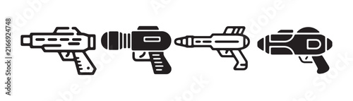 Obraz na plátně Futuristic laser gun icon set featuring various retro space blaster designs for gaming interface