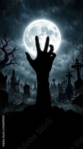 Halloween horror scene featuring zombie hand reaching from grave in rainy cemetery with full moon and tombstones.
