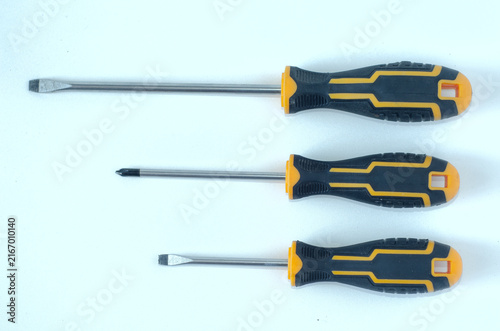 Canvastavla Assorted Screwdrivers on White Background Top View