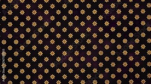 Gold floral pattern on dark black background.