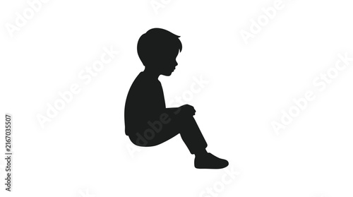Seated boy in profile is a dark silhouette against a white background