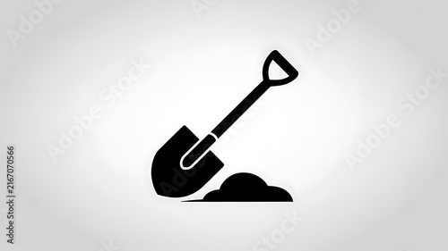 Black shovel icon digging in the dirt