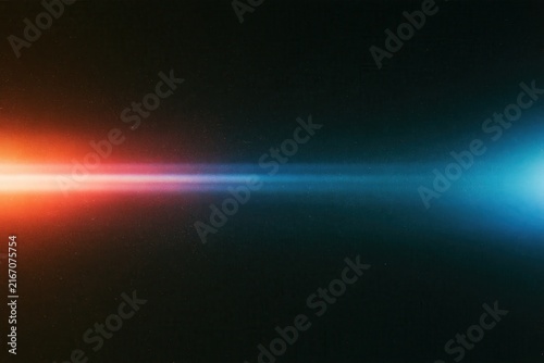 Vintage analog light leak streak horizontally glowing on dark grainy background with warm orange cool cyan blue gradient banner
