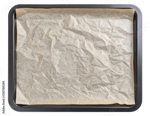 Baking sheet with crumpled parchment paper lining