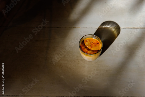 Cold Dirty Coffee Espresso with Milk on Wooden Table Top View