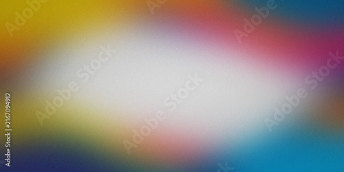 Vibrant rainbow gradient background with soft grainy light texture for digital designs.