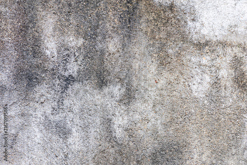 Weathered grey concrete wall texture with rough mottled surface