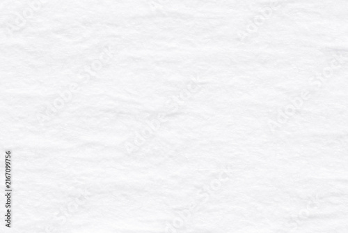 White textured paper surface as a blank background with copy space