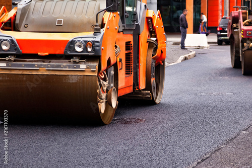Photography Heavy Machinery Works on Asphalt Repair in Urban Streets During Daylight