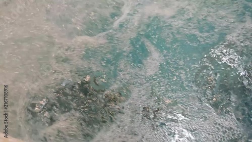 Churning Foamy Water Surface Close Up