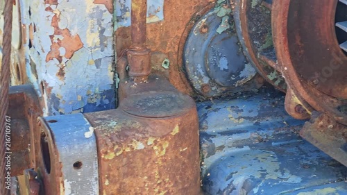 Weathered Blue Industrial Machine With Rusty Parts