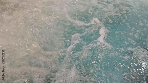 Soft Turquoise Water Surface With Gentle Foam