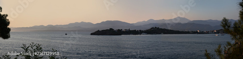 Panoramic landscape with a sea bay under a soft evening sky. Fethiye, Turkey