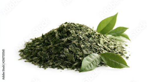 Green tea pile with fresh leaves, clean white backdrop.