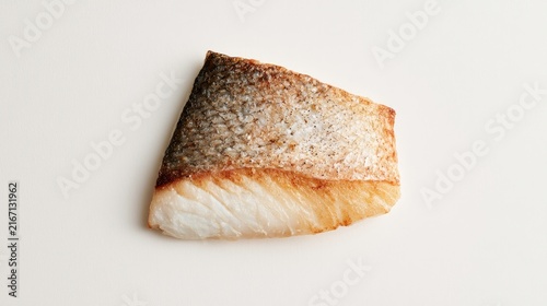 Fresh baked fish portion served on clean surface