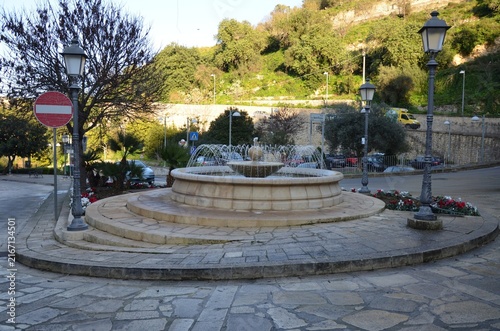 large circular fountain at the lower entrance to Ragusa Ibla