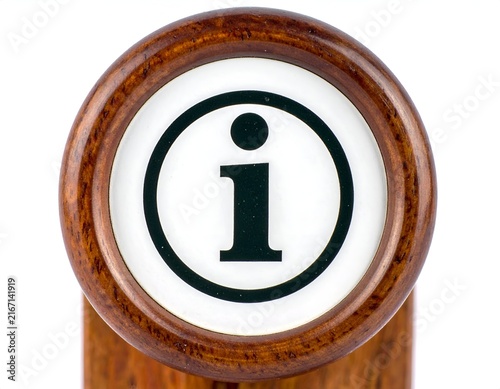 Info icon set within a circular wooden frame.
