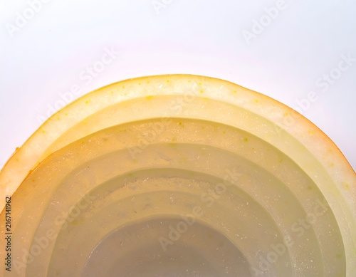 Layered fresh onion rings macro.
