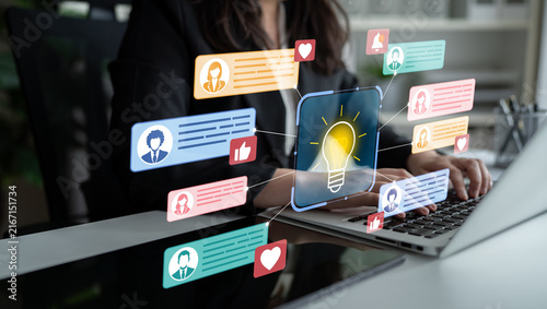 Bild auf Leinwand Businesswoman Creating Innovative Ideas with Digital Communication and Social Media Icons in Modern Office Environment