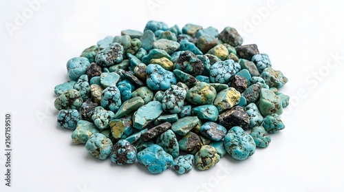 Raw turquoise gemstone pebbles pile on white background for jewelry and mineral collection.