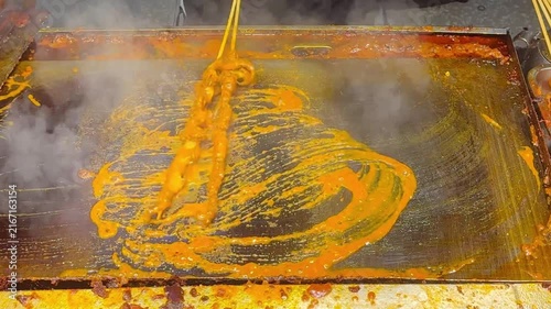 Korean Street Food – Grilling Squid and Octopus Skewers in Spicy Red Sauce at Outdoor Market Stall