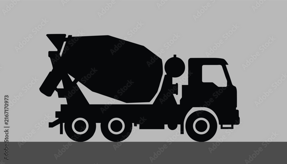 Fototapeta premium Bold black silhouette of a concrete mixer truck driving on a gray surface against a light gray sky backdrop.