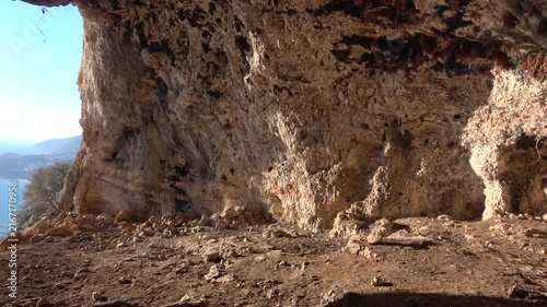Kas, Turkey - February 16, 2026: View of Kas coastline through ancient cave opening
