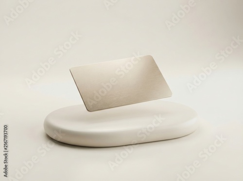 Floating gold credit card on a minimalist pedestal for luxury banking and finance concepts.