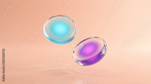 Two floating glossy glass spheres with glowing blue and purple light on a soft peach background