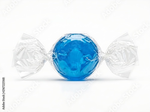 Bright blue spherical candy wrapped in clear plastic cellophane wrapper isolated on bright white surface.