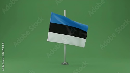Estonian flag waving in wind on green background for national identity and pride