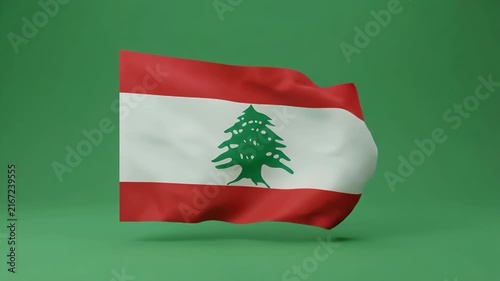 Lebanese flag waving in wind against green background for national identity and pride