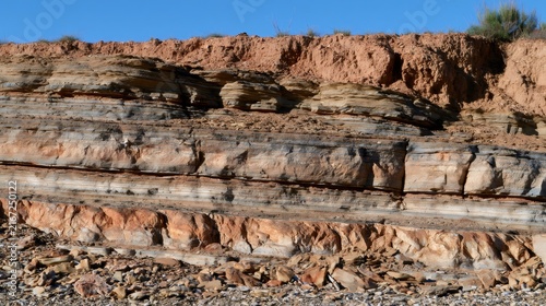 Layered sedimentary rock formations showing geological stratification and erosion