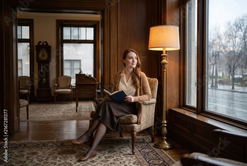 Woman Reading Book by Rainy Window in Elegant Classic Interior
