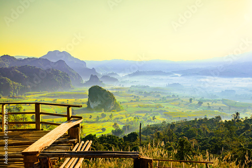 Landscape Series : Golden Twilight illuminates the misty sunrise over Phu Langka viewpoint in Phayao Thailand.