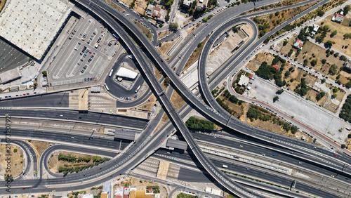 фотографія Aerial drone photo of urban multilevel highway junction road using multiple brid
