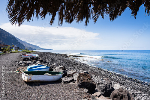 Fishing boats on volcanic beach in La Palma, Canary Islands
