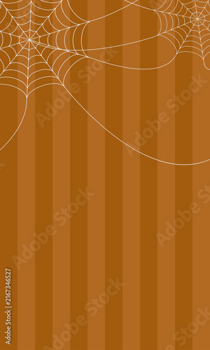 Halloween pumpkin orange striped background with hanging white spider webs and copy space.