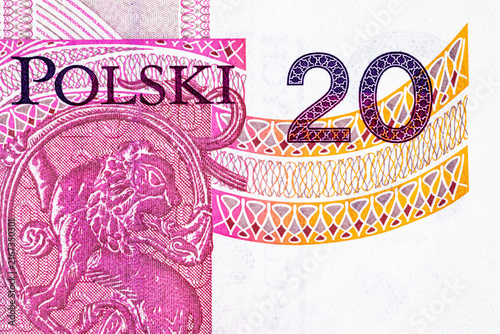 Fotografie Extreme macro close-up of the denomination number 20 and decorative guilloche patterns on a Polish 20 zloty banknote