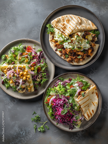 Mediterranean pita flatbreads with fresh salads and chickpeas