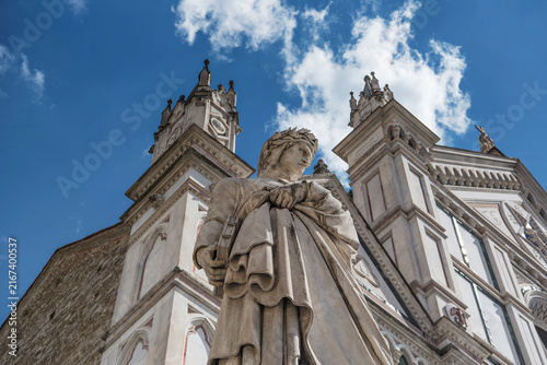A statue of Dante Alighieri near the basilica of Santa Croce in Florence Italy