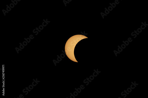 Fotografie Partial Solar Eclipse Phase with Visible Sunspots in Spain