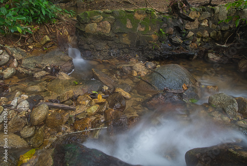 Bild auf Leinwand Stream at the hot springs, Honduras