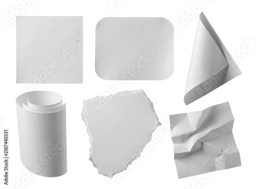 Set of white paper samples roll torn scrap crumpled isolated on white. Papercraft mockups and texture collection concept. Blank white paper shapes arranged in studio setting.