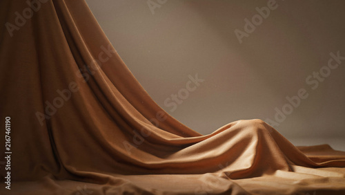 Luxury Neutral Interior Scene with Draped Curtain and Warm Sunlight for Premium Advertising Background