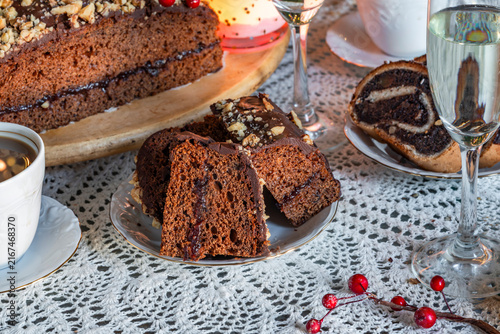 Christmas coffee with selection of gourmet cakes and champagne