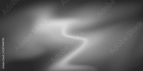 Abstract grainy dark gradient with elegant curved light flow creating organic motion effect for modern minimal banner presentation.